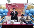 רובע ט' לבש חג: ספר תורה הוכנס ברוב עם לבית חב"ד